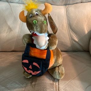 Vintage Royal Plush brown dinosaur with Halloween bag.  New with tags